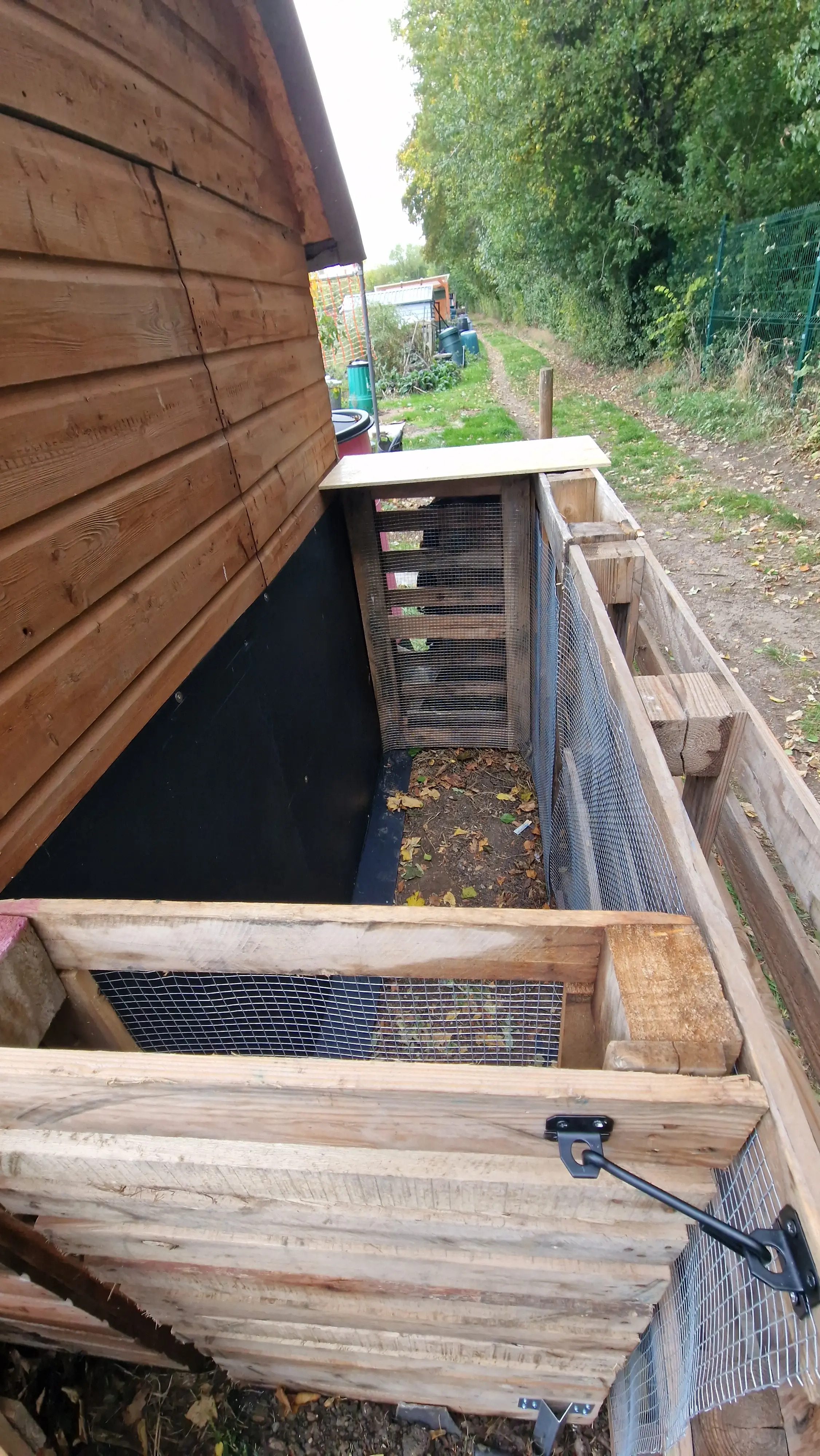 Interior view showing mesh lining and wooden frame